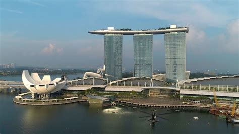 Premium Photo | Aerial view of marina bay sands revealing singapore ...