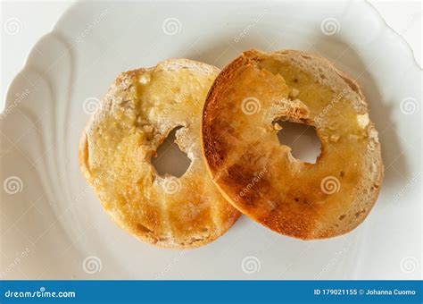 Toasted And Buttered Hot Cross Bun Royalty Free Stock Photo
