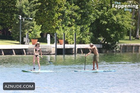 Gisele Bundchen Paddles Into Miami In A Sexy Black Bikini AZNude