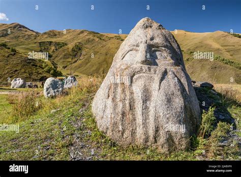 Stone Faces Sculptures In The Sno Village In Caucasus Mountains