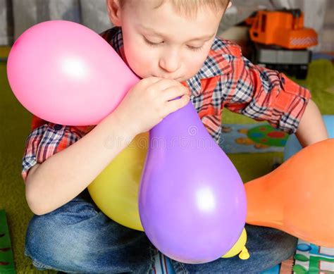 Boy Inflates Balloon Stock Photos Free And Royalty Free Stock Photos