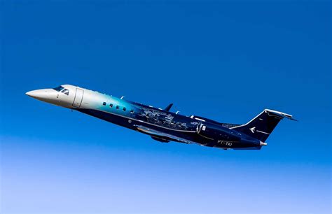 Embraers Unique Legacy 650e Paint Scheme Makes A Splash At Labace