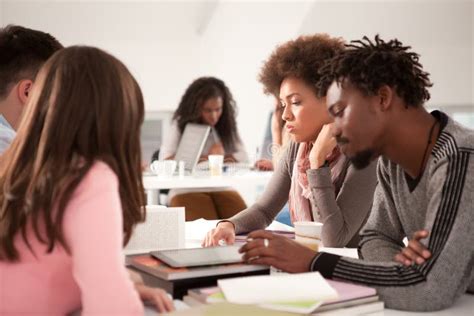 Group Of College Students Studying Together Stock Photo Image Of Read