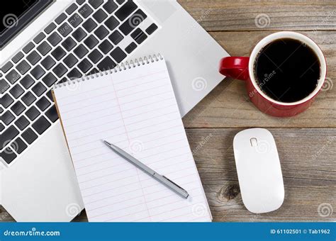 Blank Notebook And Pen With Laptop On Office Desktop Stock Image