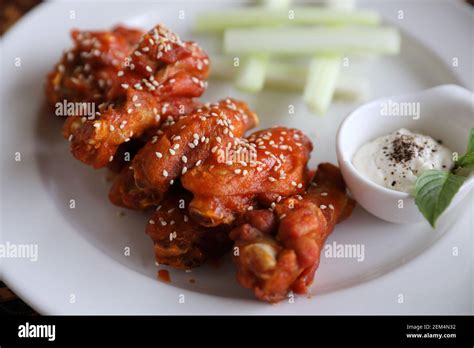 Buffalo Wings Fried Chicken With Hot And Spicy Sauce Stock Photo Alamy