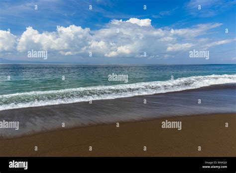 Black Volcanic Sand Beach In Bali Island Indonesia Stock Photo Alamy