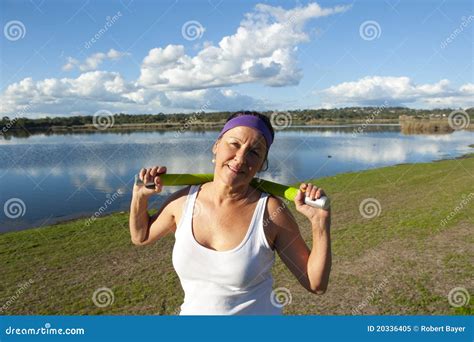 Mature Woman Doing Exercise Stock Image Image Of Living Blue 20336405