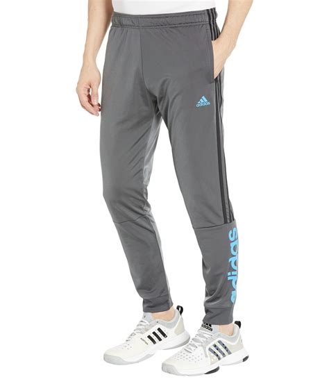 Adidas Essentials Tricot Stripes Linear Track Pants In Gray For Men