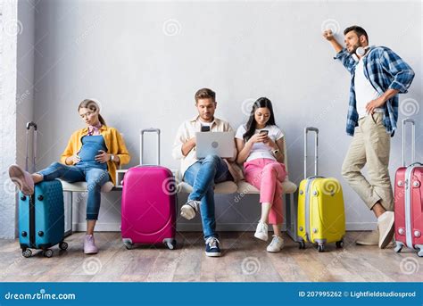 Four Multicultural People Waiting In Hall Stock Photo Image Of Chairs