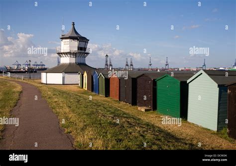 Colourful Seaside Beach Huts And Low Lighthouse Maritime Museum Harwich