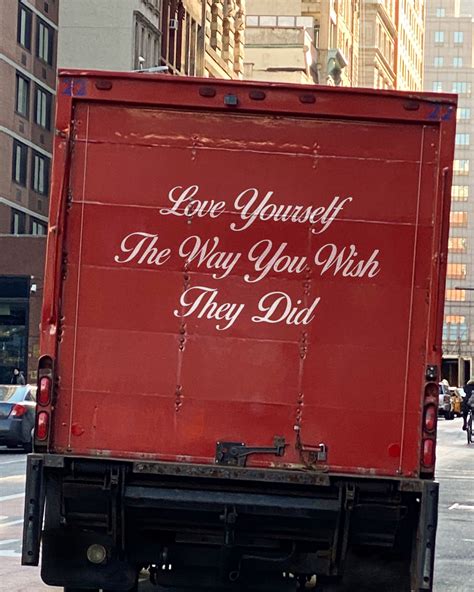 The Back Of A Red Van That Reads Love Yourself The Way You Wish They