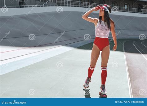 Roller Girl Beautiful Woman Is Going Rollerblading At The Skatepark