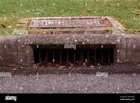 Old Fashioned Curbside Storm Drain Stock Photo Alamy