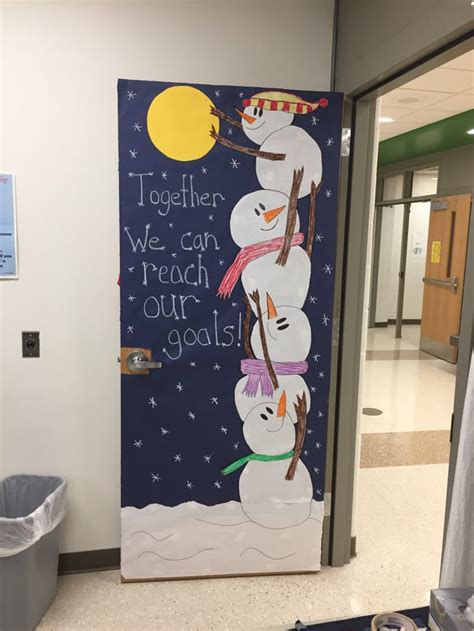 A Door Decorated With Snowmen And The Words Together We Can Reach Our
