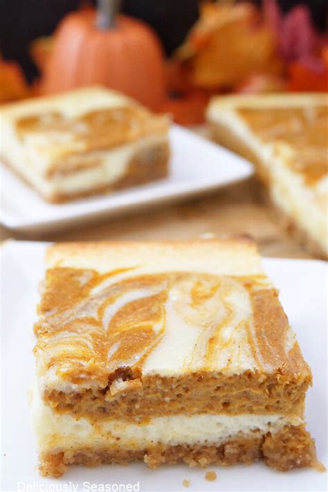 Pumpkin Swirl Cheesecake Bars Deliciously Seasoned