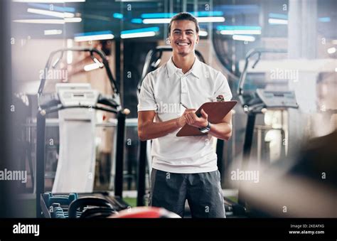 Gym Fitness And Portrait Of A Personal Trainer With A Clipboard For A