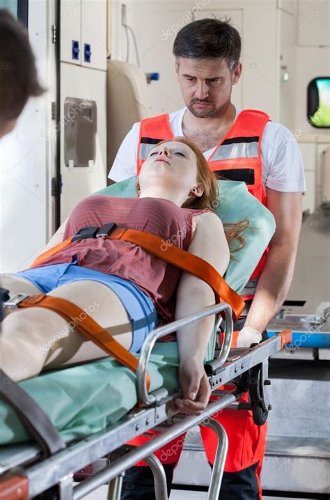 Senseless Girl Lying On Stretcher Stock Photo By Photographee Eu 53951035