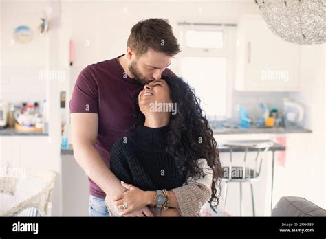 Couple Hugging Kissing Hi Res Stock Photography And Images Alamy