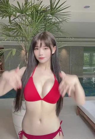 Breathtaking C Shows Cleavage In Red Bikini Sexyfilter