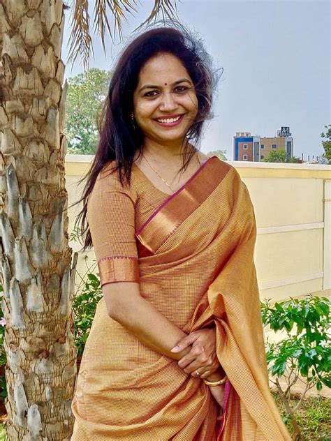 Gorgeous Indian Singer Sunitha In Traditional Yellow Saree Indian