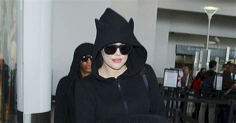 Khloe Kardashian Wears Cat Ears Hoodie While Walking Through LAX Airport