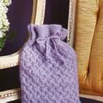 Cosy Cabled Hot Water Bottle Cover Knitting Patterns Let S Knit Magazine