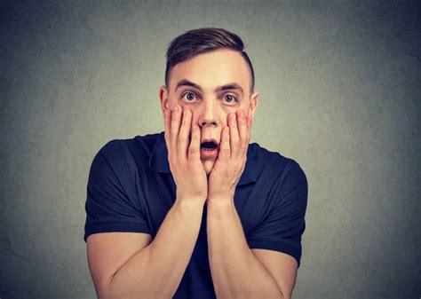 Shocked Man Looking At His Mobile Phone Seeing Bad News Reading Text