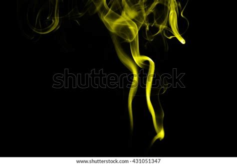 Abstract Yellow Smoke On Black Background Stock Photo 431051347