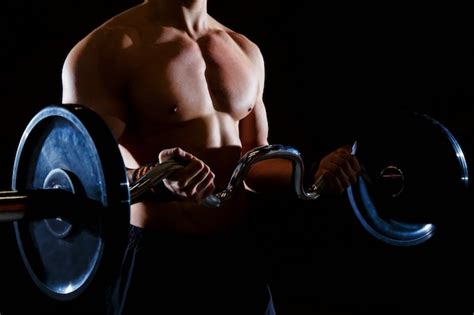 Premium Photo Muscular Man Workout With Barbell At Gym Dead Lift