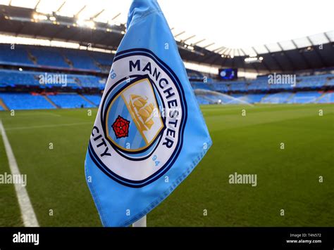 A Manchester City Branded Corner Flag As The Pitch Is Watered Ahead Of