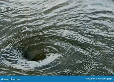 Water vortex stock photo. Image of vortex, draining, swirl - 1376158