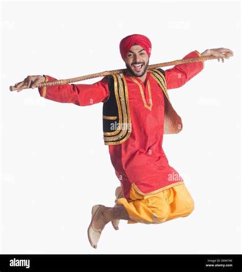 Man Doing Bhangra The Folk Dance Of Punjab In India Stock Photo Alamy