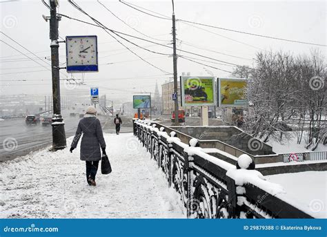 Woman Walking On Snow Covered Street Editorial Stock Photo Image Of