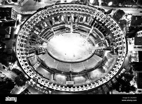 Black And White View Of Ancient Ruins Of Roman Amphitheatre In Pula