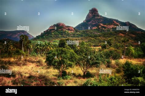 Sacred mountain in India Stock Photo - Alamy