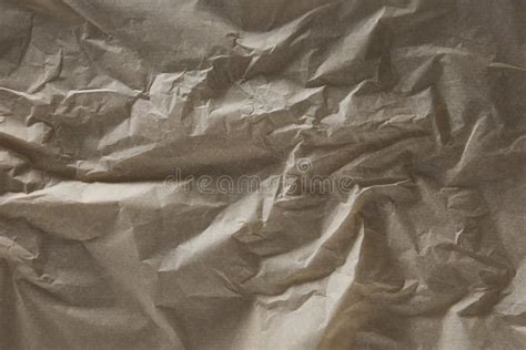 El Papel Arrugado Beige Machacó El Fondo De La Textura Imagen de