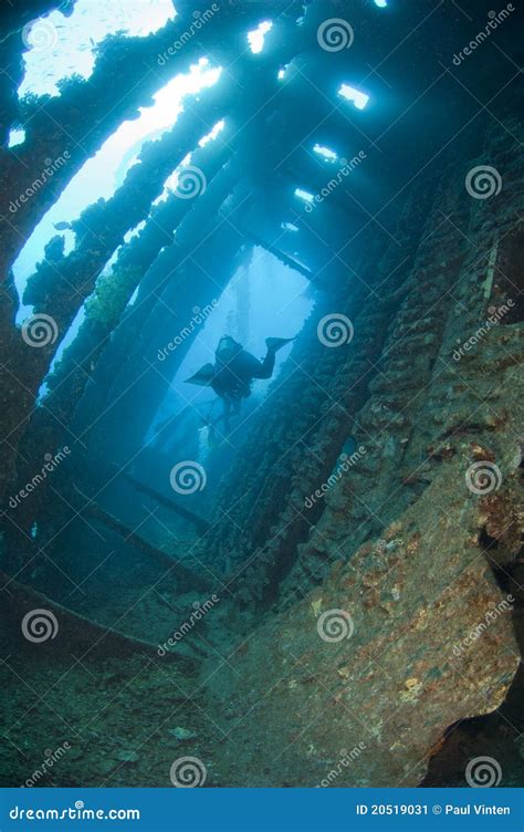 Divers Exploring A Large Shipwreck Stock Image Image Of Ship Inside