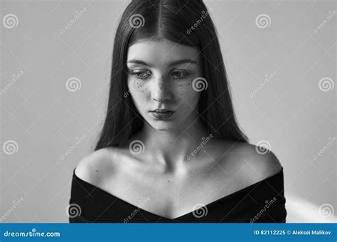 Dramatic Black And White Portrait Of A Beautiful Lonely Girl With