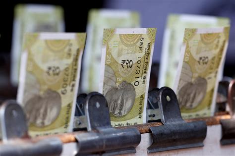 Rupee Touches Near Two Week High On Broad Dollar Weakness Reuters