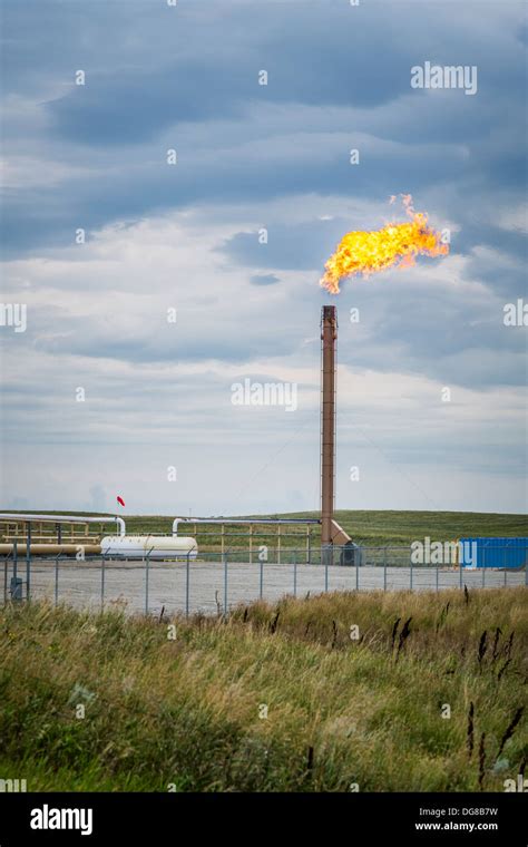 A Flaring Natural Gas Well In The Bakken Play Oil Schale Field Near