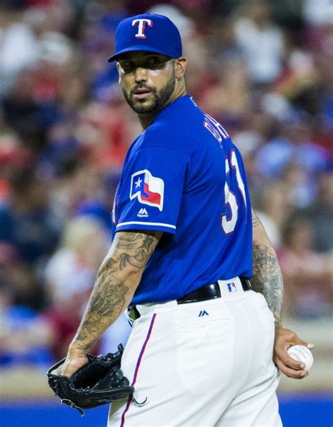 Texas Rangers relief pitcher Matt Bush (51) looks over his shoulder at ...