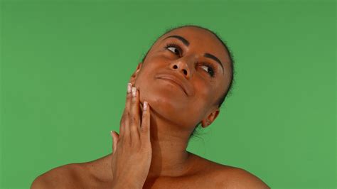 Attractive Mature African Woman Touching Her Skin Gently Stock Video At Vecteezy