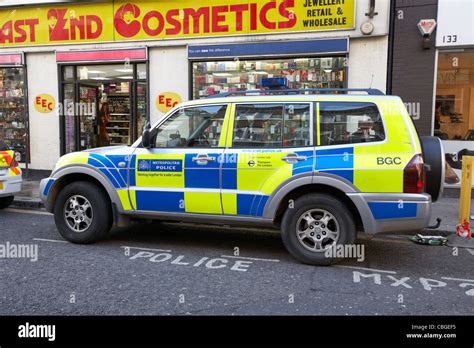 Metropolitan Police 4x4 Vehicle In Battenburg Chequered Livery Parked