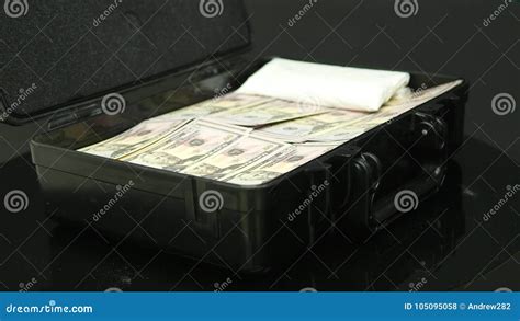 A Man Opens A Black Metal Suitcase With Money Stock Photo Image Of