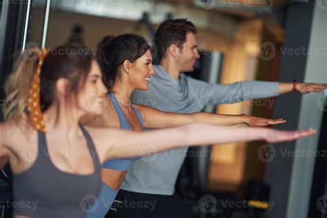 Group of people working out in a gym 15867506 Stock Photo at Vecteezy