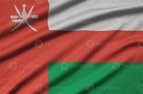 Oman Flag Is Depicted On A Sports Cloth Fabric With Many Folds Sport