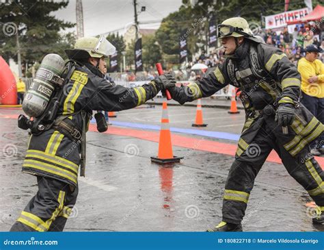 Professional Firefighters Completing The Circuit During The Competition