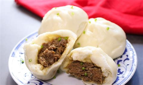 Chinese Steamed Pork Buns Served On A Plate As Part Of A Dim Sum Style Lunch Steamed Pork Buns