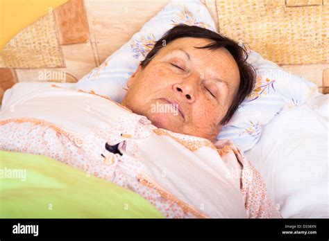 Mature Woman Sleeping Bed Hi Res Stock Photography And Images Alamy