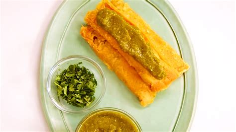 Chicken & Cheese Tamales with Green Chile Sauce Recipe | Bon Appétit